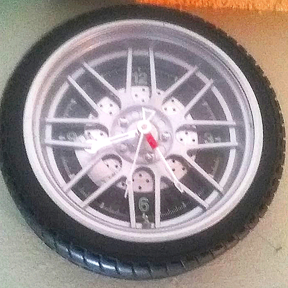 10" racing wheel wall clock